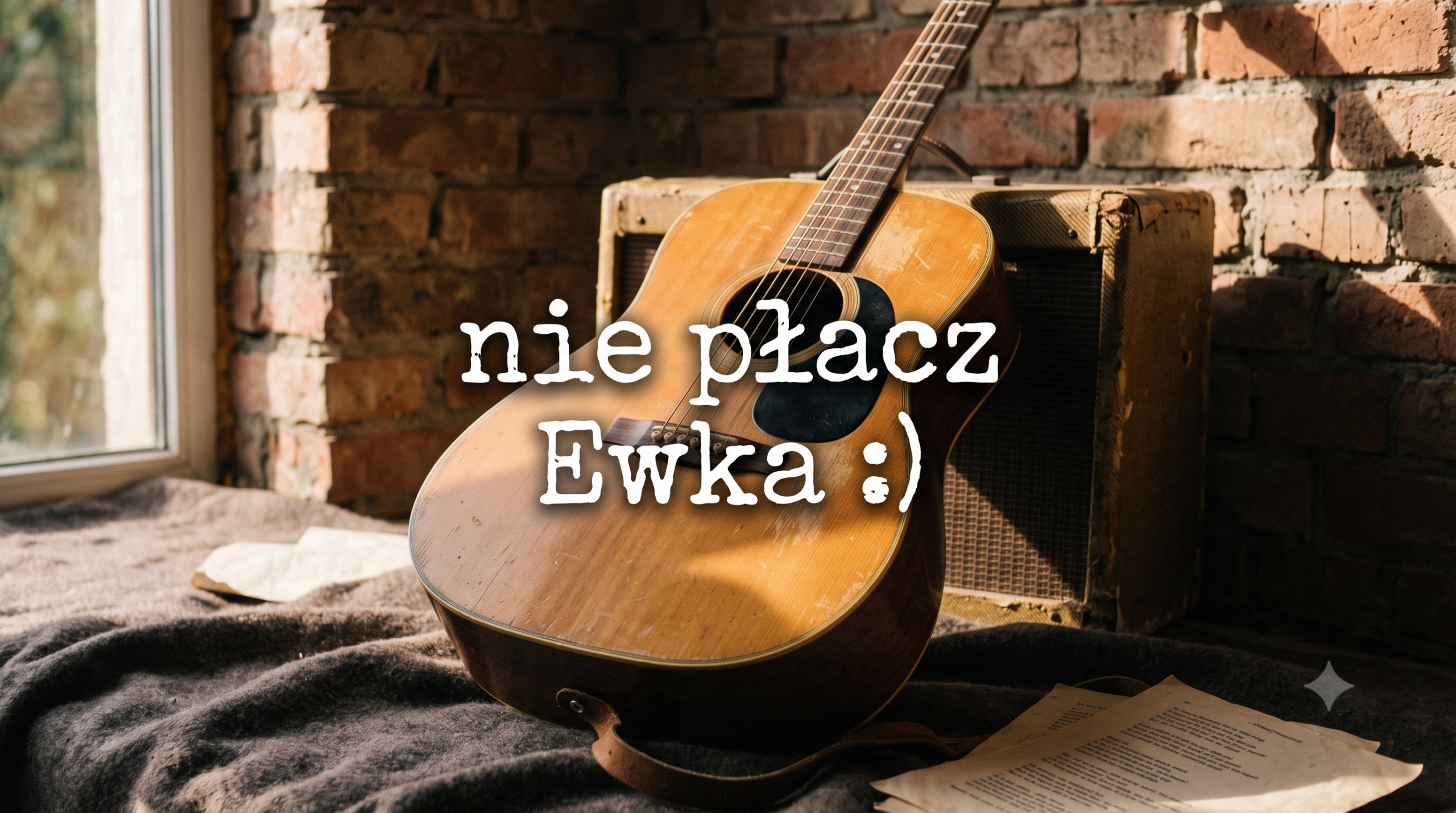 Gitara akustyczna oparta o ceglaną ścianę z napisem Nie płacz Ewka akordy
